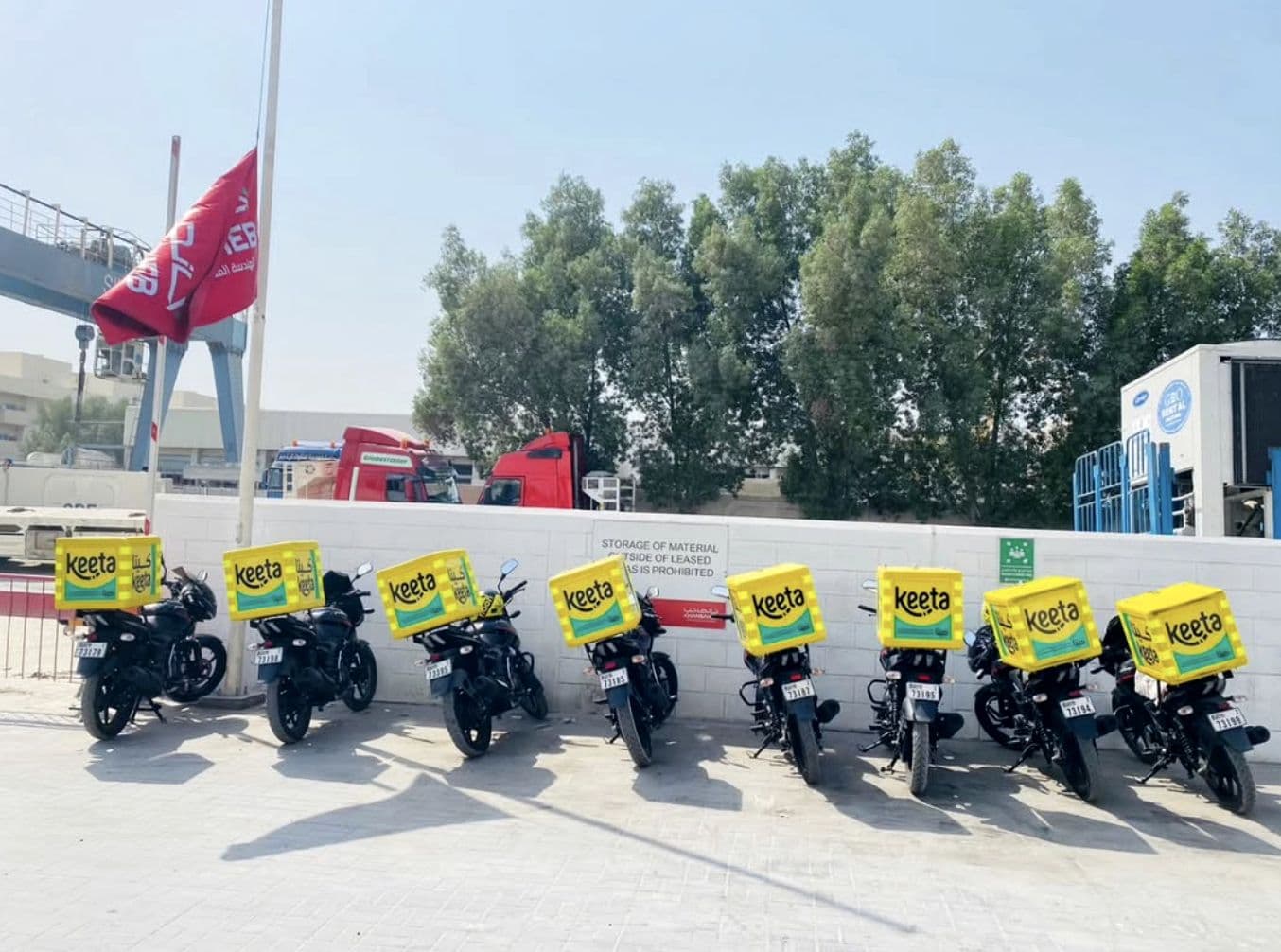 A row of Nysaa managed-fleet delivery bikes ready for Keeta in Dubai